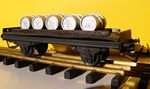 P.M.P. Wagon plateforme chargement fts d'essence,  essieux.