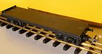 P.M.P. Wagon plat sans ridelle,  bogies