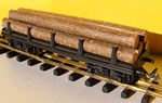 P.M.P. Wagon  ranchers, chargement troncs d'arbres,  essieux.
